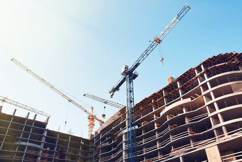 Crane in front of building